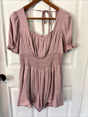 She sky pale pink romper Size Large NWT
